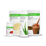 Herbalife product ultimate healthy breakfast lineup including protein drink mix, mango aloe concentrate, and healthy meal replacement (smooth chocolate) on a white background.