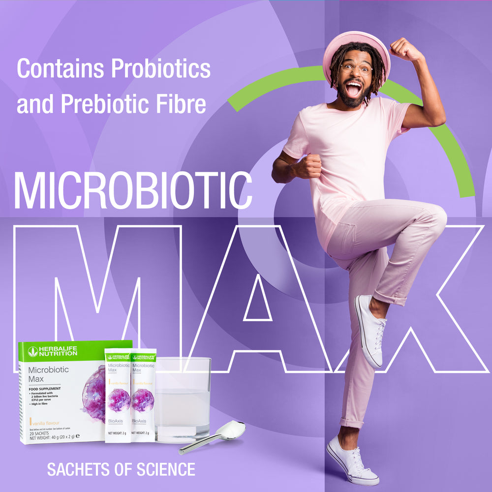 
                  
                    Load image into Gallery viewer, Energised and happy man with a pink hat next to Herbalife Nutrition Microbiotic Max box and sachets
                  
                